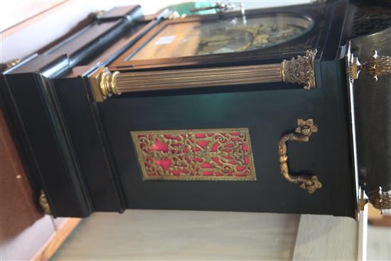 A late 19th century ebonised and brass inlaid quarter chiming bracket clock, height 65cm.